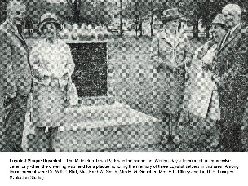 1965 event photo: 'Loyalist Plaque Unveiled' – The Middleton Town Park was the scene last Wednesday afternoon of an impressive ceremony when the unveiling was held for a plaque honoring the memory of three Loyalist settlers in this area. Among those present were Dr. Will R. Bird, Mrs. Fred W. Smith, Mrs H. G. Goucher, Mrs. H.L. Ritcey and Dr. R. S. Longley. (Goldston Studio)